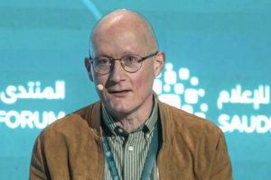 IPTC Managing Director Brendan Quinn on stage at the Saudi Media Forum, 2026.