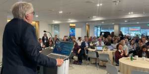 Bruce MacCormack, Chair of the IPTC Media Provenance Committee, speaks to over 100 assembled media provenance experts at the IPTC Media Provenance Summit, held at Reuters Toronto on April 16th.